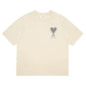 AMI Paris Oversized Logo-Appliquéd Cotton-Jersey T-Shirt Cream