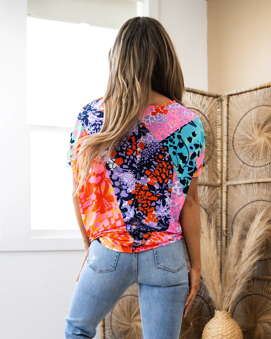 Judy Neon Pink and Navy Mixed Pattern V Neck Top